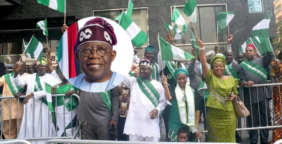 Happy Nigerian people holding their flags.