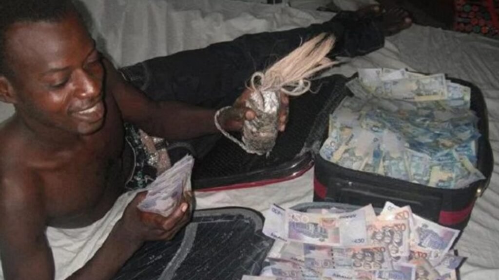 Voodod priest with money